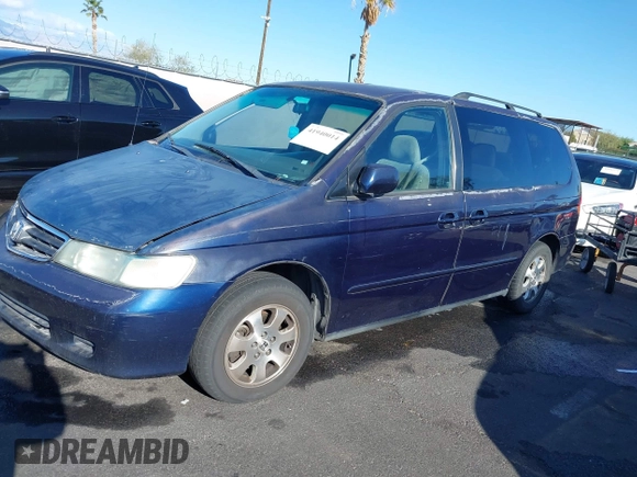 2004 Honda Odyssey EX z VIN 5FNRL18614B080980, wystawiony jako IAAI lot #41940014 z przebiegiem 233 465 mil mil oraz . Historia ofert i sprzedaży dostępna na DreamBid. Obrazek 6.