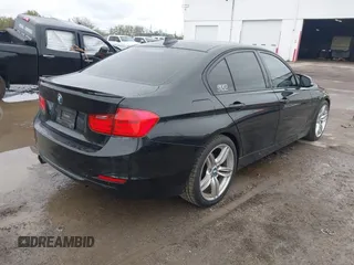 2013 BMW 3 Series 328i with VIN WBA3C1G52DNN93698, listed as a IAAI auction lot 41673985 with 160,233 mi miles and . Bid and sale history available at DreamBid. Image 4.
