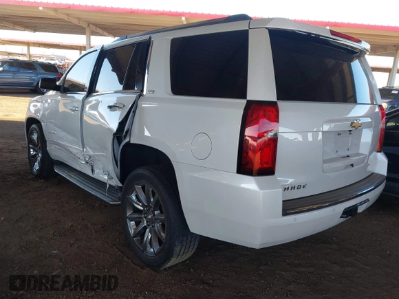 2016 Chevrolet Tahoe LTZ z VIN 1GNSKCKC4GR359442, wystawiony jako IAAI lot #41871814 z przebiegiem 158 533 mil mil oraz . Historia ofert i sprzedaży dostępna na DreamBid. Obrazek 3.