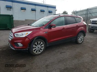 2018 Ford Escape Titanium with VIN 1FMCU9J94JUC62242, listed as a Copart auction lot 59770835 with 139,316 mi miles and Salvage title. Bid and sale history available at DreamBid. Image 1.