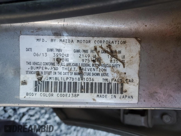 2013 Mazda 3 i Touring z VIN JM1BL1LP7D1841036, wystawiony jako Copart lot #53365045 z przebiegiem 166 539 mil mil oraz Szkoda całkowita • Salvage title. Historia ofert i sprzedaży dostępna na DreamBid. Obrazek 14.