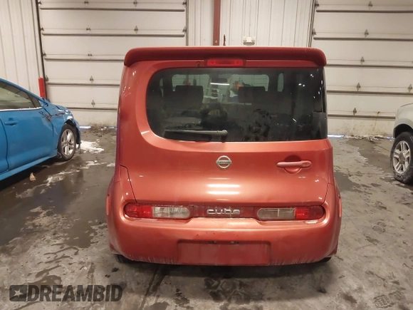 2009 Nissan Cube SL z VIN JN8AZ28R29T119001, wystawiony jako IAAI lot #41583215 z przebiegiem 203 906 mil mil oraz . Historia ofert i sprzedaży dostępna na DreamBid. Obrazek 12.