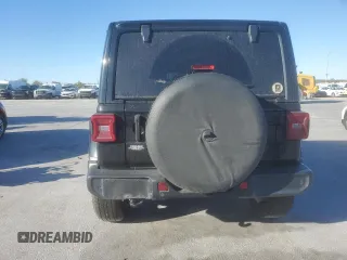 2021 Jeep Wrangler Unlimited Sahara Altitude with VIN 1C4HJXEN3MW659058, listed as a Copart auction lot 48786955 with 88,618 mi miles and Salvage title. Bid and sale history available at DreamBid. Image 6.