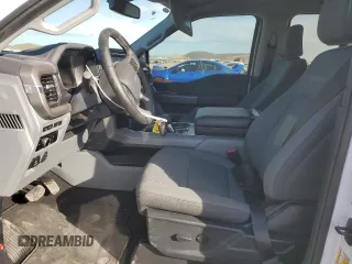 2024 Ford F-150 Lightning XLT with VIN 1FTVW3LK8RWG07888, listed as a Copart auction lot 87741505 with 2,313 mi miles and Salvage title. Bid and sale history available at DreamBid. Image 7.