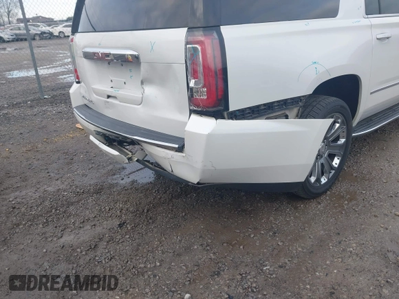 2016 GMC Yukon XL Denali with VIN 1GKS2HKJ9GR264481, listed as a IAAI auction lot 41764272 with 114,852 mi miles. Bid and sale history available at carsss.com. Image 6.