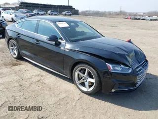 2018 Audi A5 Sportback Prestige z VIN WAUFNCF50JA010472, wystawiony jako IAAI lot #41810734 z przebiegiem 83 000 mil mil oraz . Historia ofert i sprzedaży dostępna na DreamBid. Obrazek 1.