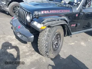 2022 Jeep Wrangler Unlimited Rubicon with VIN 1C4HJXFN0NW242903, listed as a IAAI auction lot 41448636 with 28,007 mi miles and . Bid and sale history available at DreamBid. Image 6.