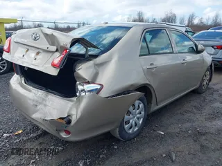 2010 Toyota Corolla with VIN 2T1BU4EE0AC312979, listed as a IAAI auction lot 41981699 with 156,842 mi miles. Bid and sale history available at carsss.com. Image 4.