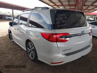 2021 Honda Odyssey Touring z VIN 5FNRL6H85MB034888, wystawiony jako IAAI lot #42386984 z przebiegiem 40 514 mil mil oraz . Historia ofert i sprzedaży dostępna na DreamBid. Obrazek 3.