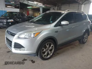2015 Ford Escape Titanium z VIN 1FMCU9J96FUB23902, wystawiony jako IAAI lot #42497188 z przebiegiem 164 452 mil mil oraz . Historia ofert i sprzedaży dostępna na DreamBid. Obrazek 2.