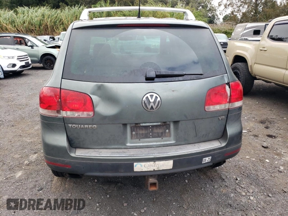 2006 Volkswagen Touareg 4.2L V8 z VIN WVGZM77L16D049631, wystawiony jako Copart lot #84882844 z przebiegiem Nie podano mil oraz Szkoda całkowita • Salvage title. Historia ofert i sprzedaży dostępna na DreamBid. Obrazek 6.