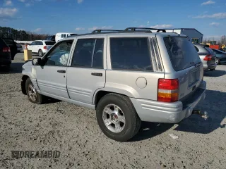 1998 Jeep Grand Cherokee with VIN 1J4GX48Y7WC216585, listed as a Copart auction lot 83532184 with 144,739 mi miles and Salvage title. Bid and sale history available at DreamBid. Image 2.