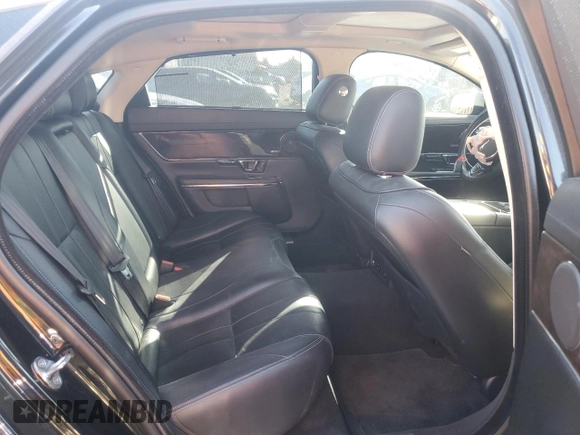 2014 Jaguar XJ with VIN SAJWA2GZXE8V59542, listed as a Copart auction lot 73672614 with 105,328 mi miles and Salvage Title. Bid and sale history available at carsss.com. Image 10.