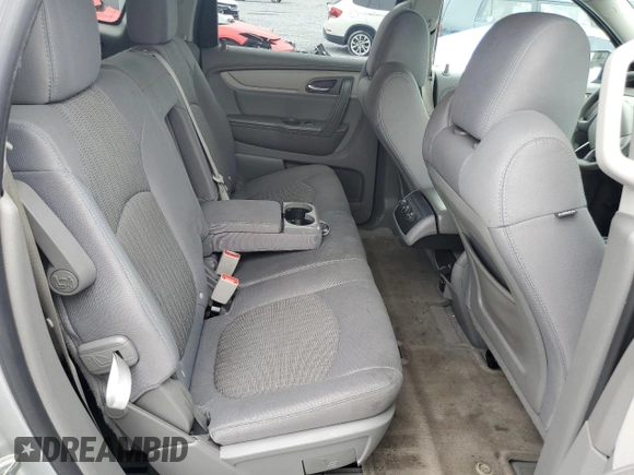 2014 Chevrolet Traverse LS z VIN 1GNKRFED0EJ257455, wystawiony jako Copart lot #58961415 z przebiegiem 136 284 mil mil oraz Szkoda całkowita • Salvage title. Historia ofert i sprzedaży dostępna na DreamBid. Obrazek 11.