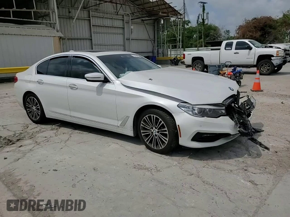 2018 BMW 5 Series 530i z VIN WBAJA5C50JG899776, wystawiony jako Copart lot #55436075 z przebiegiem Nie podano mil oraz Szkoda całkowita • Salvage title. Historia ofert i sprzedaży dostępna na DreamBid. Obrazek 13.