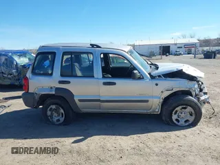 2004 Jeep Liberty Sport with VIN 1J4GL48K84W145318, listed as a IAAI auction lot 41885018 with 174,041 mi miles. Bid and sale history available at carsss.com. Image 12.