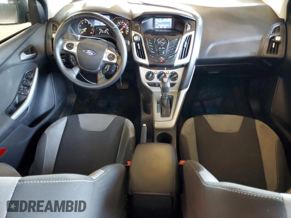 2012 Ford Focus SE with VIN 1FAHP3F28CL114572, listed as a Copart auction lot 63053035 with 142,994 mi miles and Salvage title. Bid and sale history available at DreamBid. Image 8.