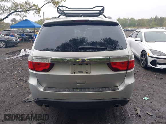 2013 Dodge Durango Crew with VIN 1C4SDJDT8DC565608, listed as a IAAI auction lot 42181773 with 161,485 mi miles and . Bid and sale history available at DreamBid. Image 16.