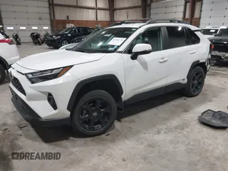 2023 Toyota RAV4 Hybrid XLE with VIN 2T3UWRFV1PW156948, listed as a IAAI auction lot 41556334 with 21,196 mi miles. Bid and sale history available at carsss.com. Image 2.