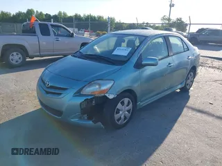 2007 Toyota Yaris with VIN JTDBT923371029654, listed as a IAAI auction lot 42142361 with 296,107 mi miles. Bid and sale history available at carsss.com. Image 2.