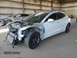 2020 Tesla Model 3 Standard Range Plus with VIN 5YJ3E1EA6LF645215, listed as a Copart auction lot 47882375 with 69,317 mi miles and Salvage Title. Bid and sale history available at DreamBid. Image 1.