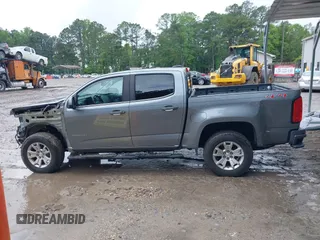 2018 Chevrolet Colorado 4WD LT z VIN 1GCGTCEN6J1146104, wystawiony jako IAAI lot #42338356 z przebiegiem 71 043 mil mil oraz . Historia ofert i sprzedaży dostępna na DreamBid. Obrazek 15.