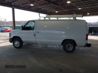 2012 Ford Econoline Cargo Commercial with VIN 1FTNE1EW3CDA31914, listed as a IAAI auction lot 41622154 with 99,254 mi miles and . Bid and sale history available at carsss.com. Image 14.