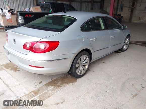 2011 Volkswagen CC Sport with VIN WVWMP7AN3BE733004, listed as a IAAI auction lot 42188172 with 169,293 mi miles. Bid and sale history available at carsss.com. Image 4.