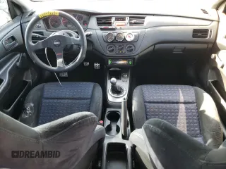 2005 Mitsubishi Lancer z VIN JA3AH36D85U043623, wystawiony jako Copart lot #52597975 z przebiegiem 171 445 mil mil oraz Czysty tytuł • Clean title. Historia ofert i sprzedaży dostępna na DreamBid. Obrazek 8.