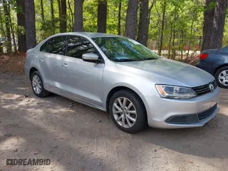 2014 Volkswagen Jetta Sedan SE with VIN 3VWD07AJ9EM254034, listed as a IAAI auction lot 42079707 with 153,060 mi miles. Bid and sale history available at carsss.com. Image 1.