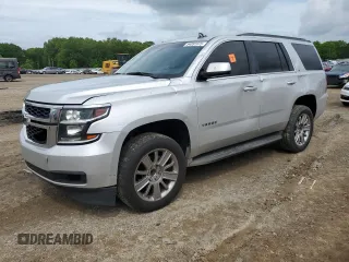 2016 Chevrolet Tahoe LS with VIN 1GNSCAKC7GR292272, listed as a Copart auction lot 54091975 with 221,137 mi miles and Salvage title. Bid and sale history available at DreamBid. Image 1.