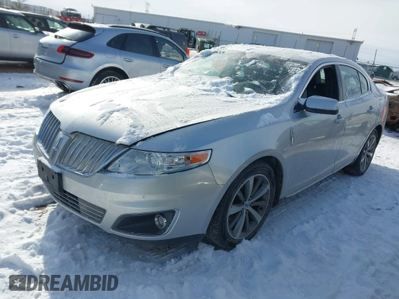 2011 Lincoln MKS z VIN 1LNHL9DR9BG610248, wystawiony jako IAAI lot #41616241 z przebiegiem 152 530 mil mil oraz . Historia ofert i sprzedaży dostępna na DreamBid. Obrazek 2.
