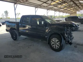 2023 Nissan Frontier SV with VIN 1N6ED1EJXPN606627, listed as a Copart auction lot 51994595 with 39,021 mi miles and Salvage title. Bid and sale history available at DreamBid. Image 4.