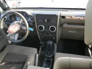 2010 Jeep Wrangler Sahara с VIN 1J4AA5D10AL181225, выставлен на аукционе Copart как лот 79696464 с пробегом 90 139 миль миль и Списание • Salvage title. История ставок и продаж доступна на DreamBid. Изображение 8.