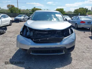 2019 Honda CR-V LX with VIN 2HKRW5H31KH411771, listed as a IAAI auction lot 42060193 with 175,036 mi miles and . Bid and sale history available at DreamBid. Image 6.