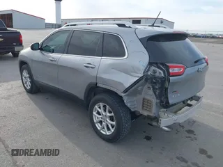 2014 Jeep Cherokee Latitude z VIN 1C4PJMCS8EW230213, wystawiony jako IAAI lot #42011183 z przebiegiem 133 299 mil mil oraz . Historia ofert i sprzedaży dostępna na DreamBid. Obrazek 3.