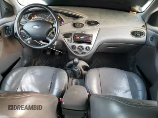 2004 Ford Focus with VIN 3FAFP37Z94R105076, listed as a Copart auction lot 82924224 with 218,253 mi miles and Clean title. Bid and sale history available at DreamBid. Image 8.