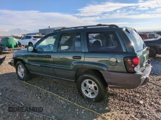 2001 Jeep Grand Cherokee Laredo with VIN 1J4GW48N21C570404, listed as a Copart auction lot 85996954 with 153,838 mi miles and Salvage Title. Bid and sale history available at carsss.com. Image 2.