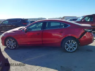 2017 Mazda 6 Touring with VIN JM1GL1V51H1126762, listed as a IAAI auction lot 41394606 with 62,072 mi miles and . Bid and sale history available at DreamBid. Image 14.