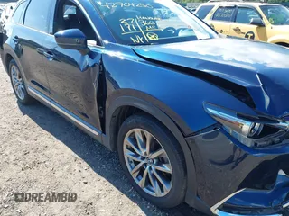 2019 Mazda CX-9 Grand Touring with VIN JM3TCBDY6K0335886, listed as a IAAI auction lot 42704250 with 37,171 mi miles and . Bid and sale history available at DreamBid. Image 17.
