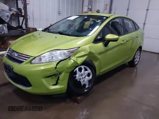 2011 Ford Fiesta SE z VIN 3FADP4BJ7BM132611, wystawiony jako IAAI lot #41931003 z przebiegiem 120 888 mil mil oraz . Historia ofert i sprzedaży dostępna na DreamBid. Obrazek 2.