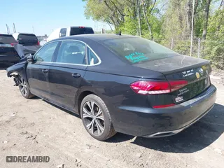 2021 Volkswagen Passat 2.0T SE with VIN 1VWSA7A32MC015219, listed as a IAAI auction lot 39240566 with 68,095 mi miles. Bid and sale history available at carsss.com. Image 3.