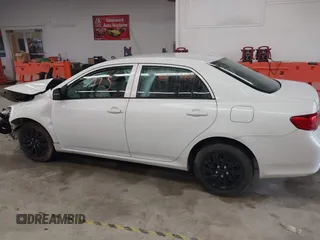 2009 Toyota Corolla z VIN 2T1BU40E89C129686, wystawiony jako IAAI lot #42251775 z przebiegiem 185 332 mil mil oraz . Historia ofert i sprzedaży dostępna na DreamBid. Obrazek 14.