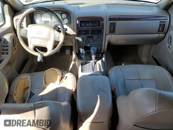 2004 Jeep Grand Cherokee Limited with VIN 1J4GW58S24C374012, listed as a Copart auction lot 44896325 with 153,978 mi miles and Salvage title. Bid and sale history available at DreamBid. Image 8.