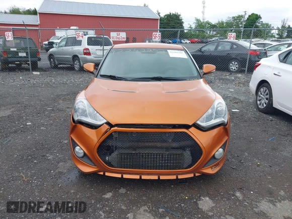 2013 Hyundai Veloster Turbo z VIN KMHTC6AE3DU124744, wystawiony jako IAAI lot #42242242 z przebiegiem 115 757 mil mil oraz . Historia ofert i sprzedaży dostępna na DreamBid. Obrazek 12.