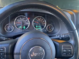2017 Jeep Wrangler Willys Wheeler z VIN 1C4AJWAGXHL602088, wystawiony jako Copart lot #80106684 z przebiegiem 101 804 mil mil oraz Czysty tytuł • Clean title. Historia ofert i sprzedaży dostępna na DreamBid. Obrazek 8.