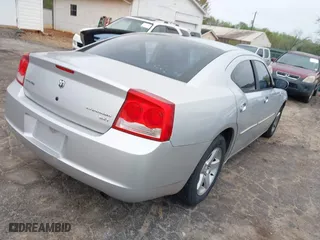2009 Dodge Charger SXT with VIN 2B3KA33V69H546018, listed as a IAAI auction lot 41957347 with 109,648 mi miles. Bid and sale history available at carsss.com. Image 4.