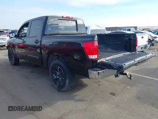 2012 Nissan Titan SL with VIN 1N6AA0EC0CN314014, listed as a IAAI auction lot 41562597 with 152,678 mi miles and . Bid and sale history available at DreamBid. Image 3.