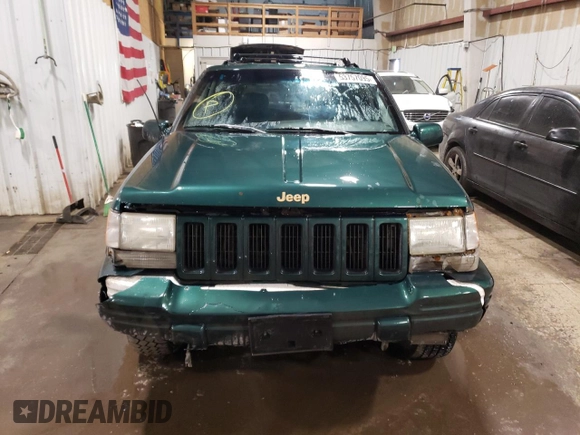 1997 Jeep Grand Cherokee Limited with VIN 1J4GZ78Y3VC733618, listed as a Copart auction lot 53757095 with 150,806 mi miles and Salvage title. Bid and sale history available at DreamBid. Image 5.