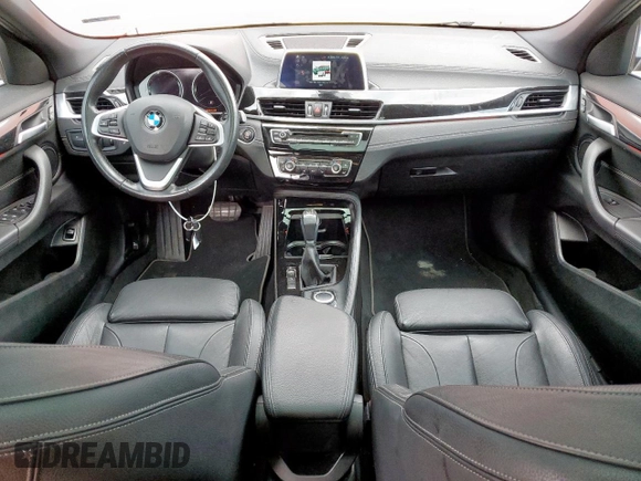 2018 BMW X2 sDrive28i with VIN WBXYJ3C37JEJ75893, listed as a Copart auction lot 62513565 with 62,029 mi miles and Salvage title. Bid and sale history available at DreamBid. Image 8.